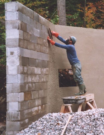 Closeup of the wall - you can see me "knocking down" the stucco just after it has been sprayed.